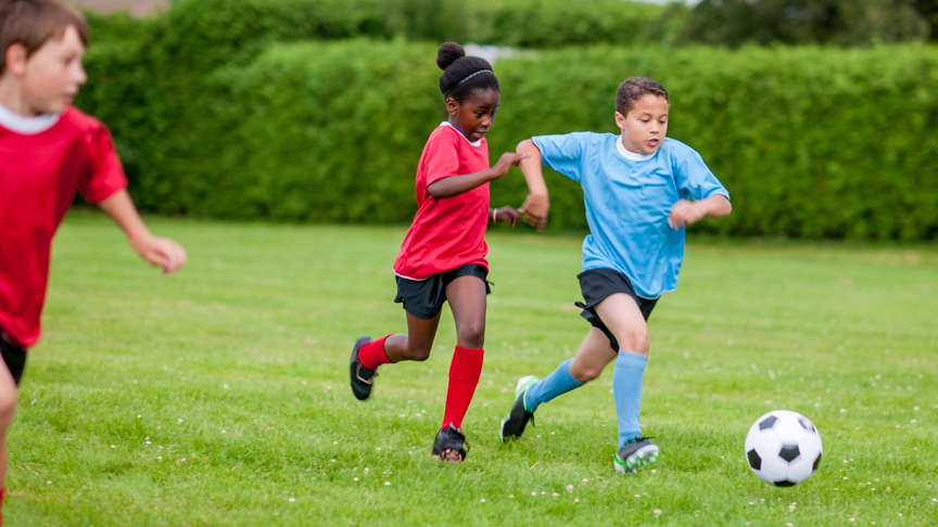 Kids playing soccer