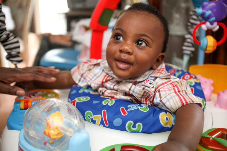 20131206_FLA_BR_132 Baby surrounded by toys