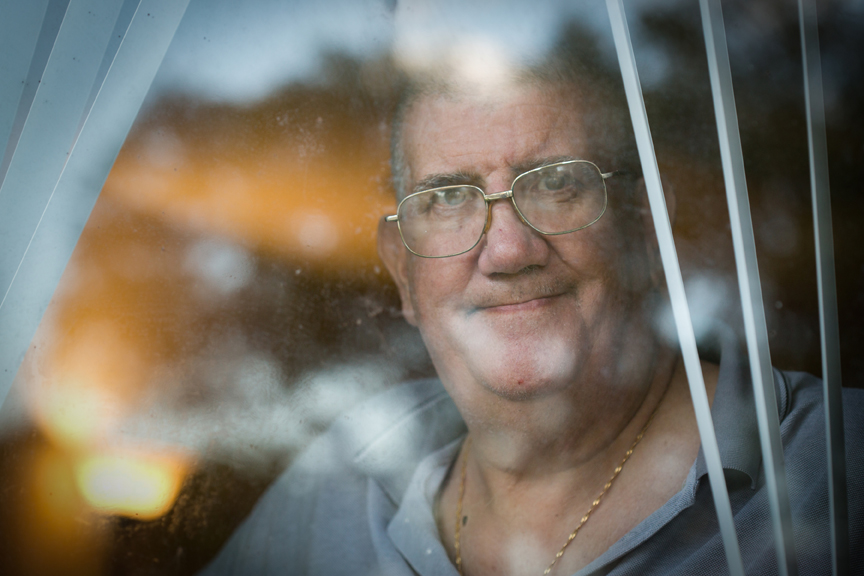 Man looking out the window