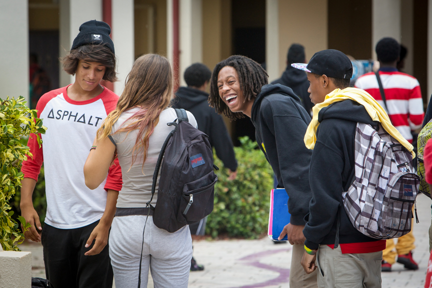 Teens hanging out at school