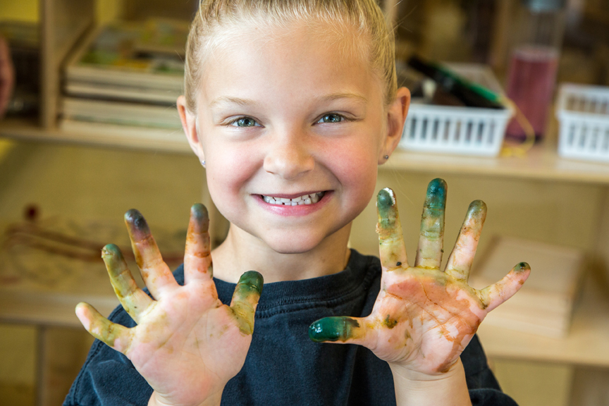 Girl finger-painting