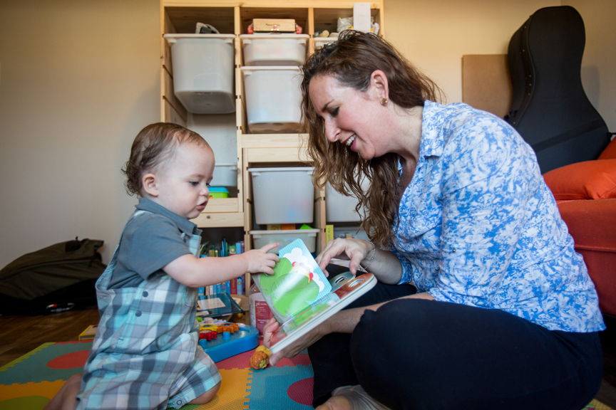 20160727_CSC_AmyLora_0114 Young boy turning pages of book with mother