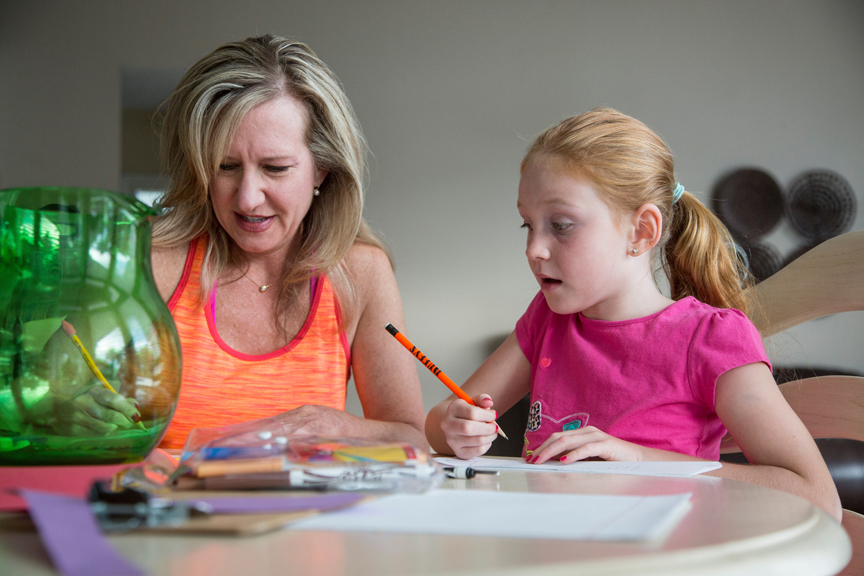 Mother and daughter working on homework