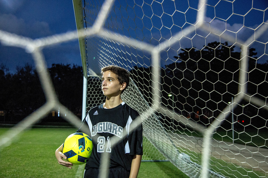 Teenage boy on soccer field