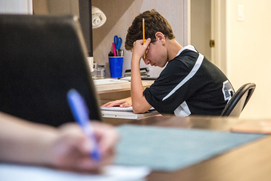 Teenage boy studying