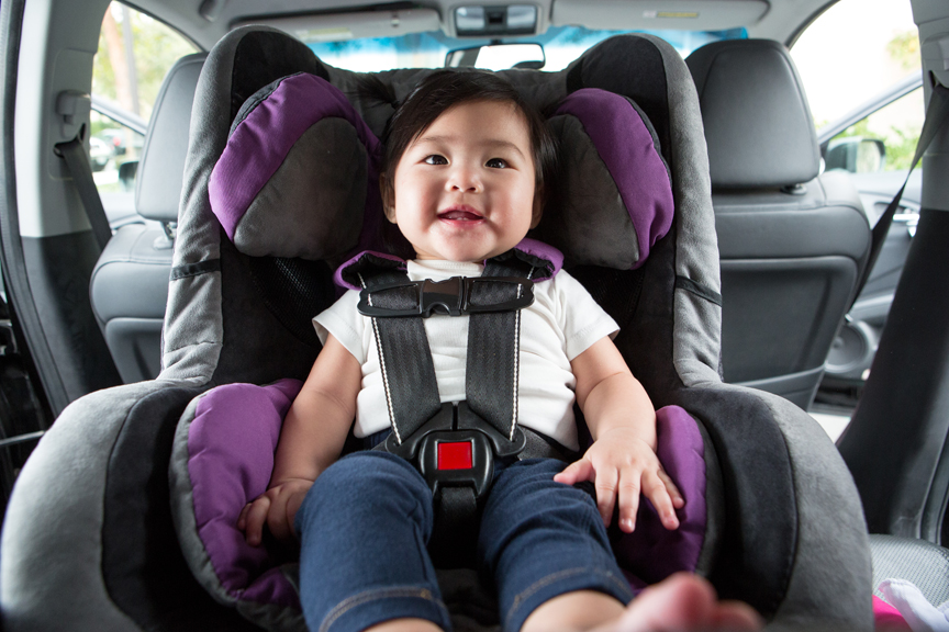 Young girl in carseat