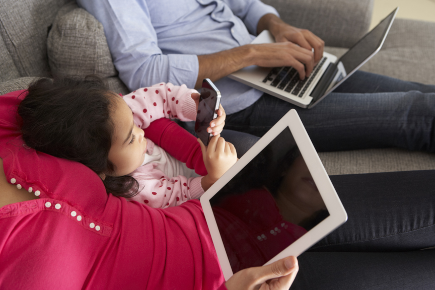 Family all on computer screens