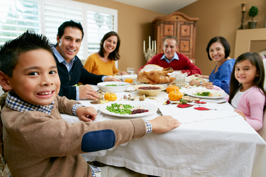Family sharing Thanksgiving meal