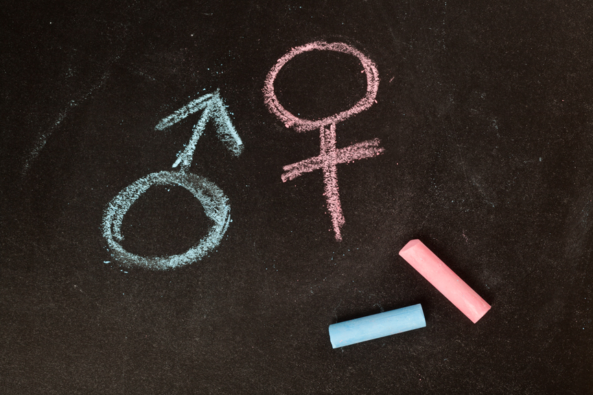 Male and female symbols in chalk