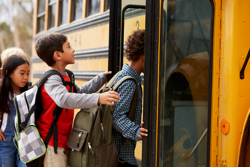 iStock-515262698 Children boarding school bus