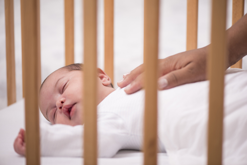 Infant in crib