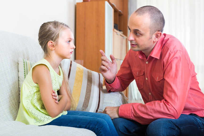 Man talking to upset girl