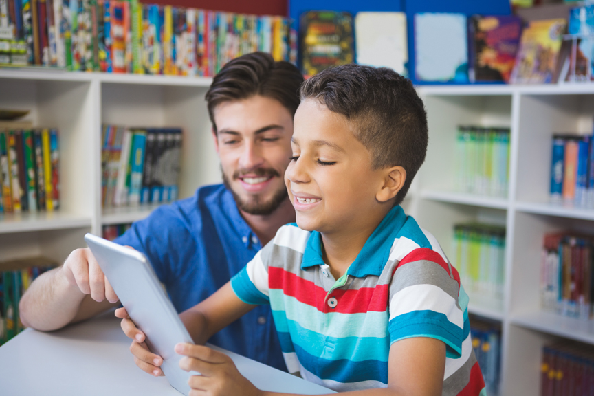 Father and son reading