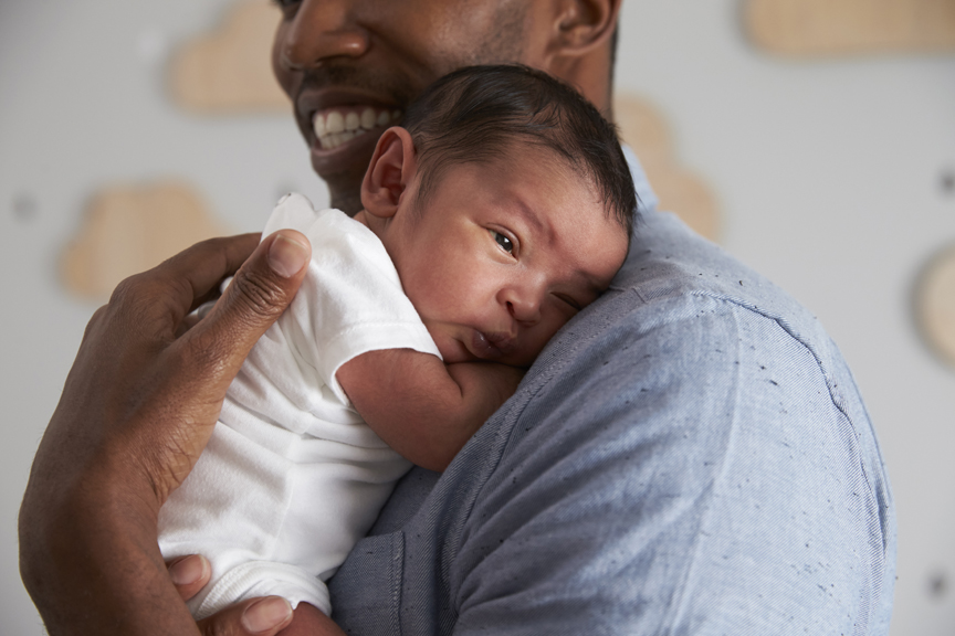 Father holding new born
