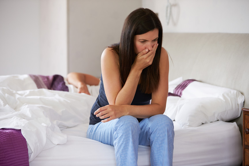 Pregnant mom looking like she is nauseous