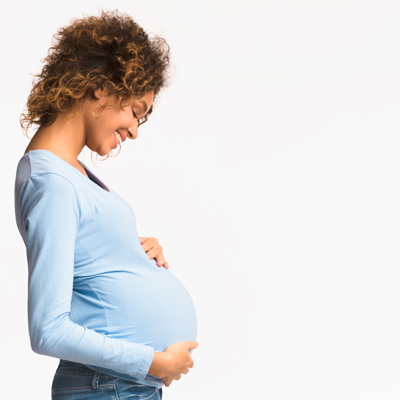 Pregnant mom holding her stomach