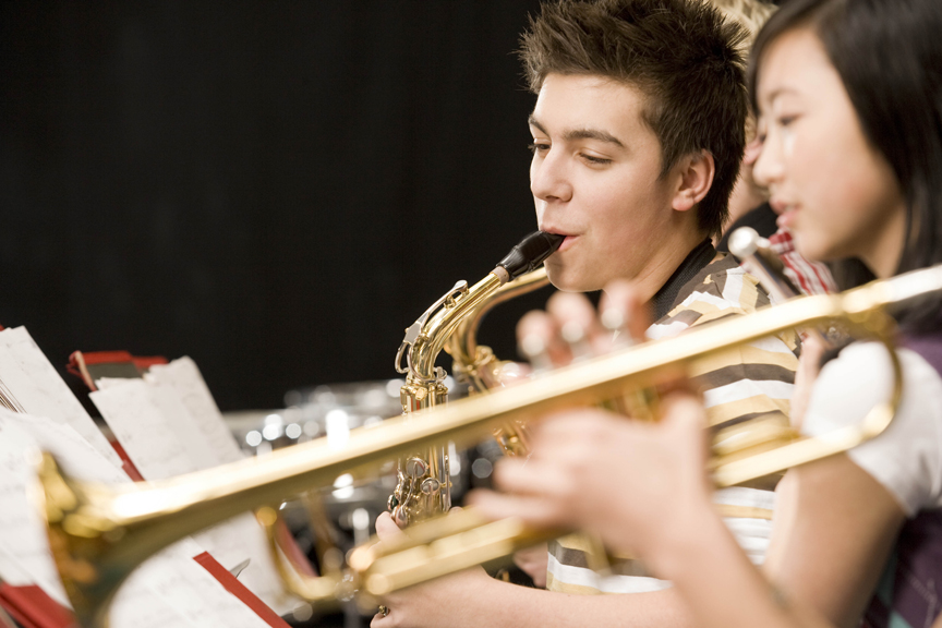 Teenagers playing instruments