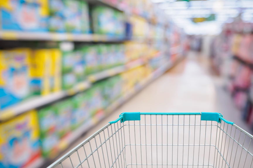 shopping cart in grocery store aisle