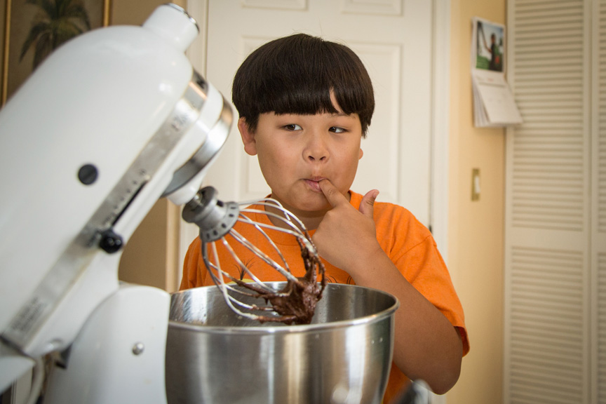 Boy baking.