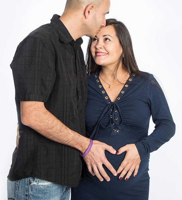 download-app-callout-image-alt Man embracing pregnant woman